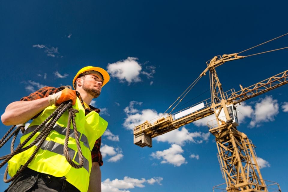 Kranführer auf Baustelle Magelware