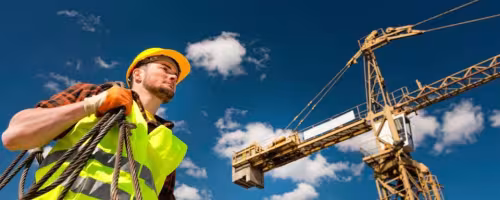 Kranführer auf Baustelle Magelware